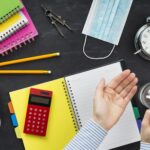 flat-lay-student-using-disinfectant